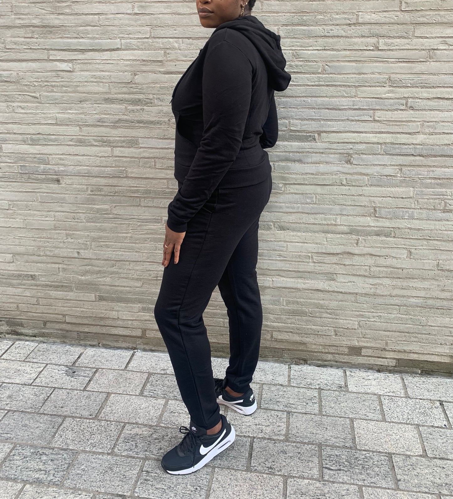 Black tall women’s joggers styled with black trainers